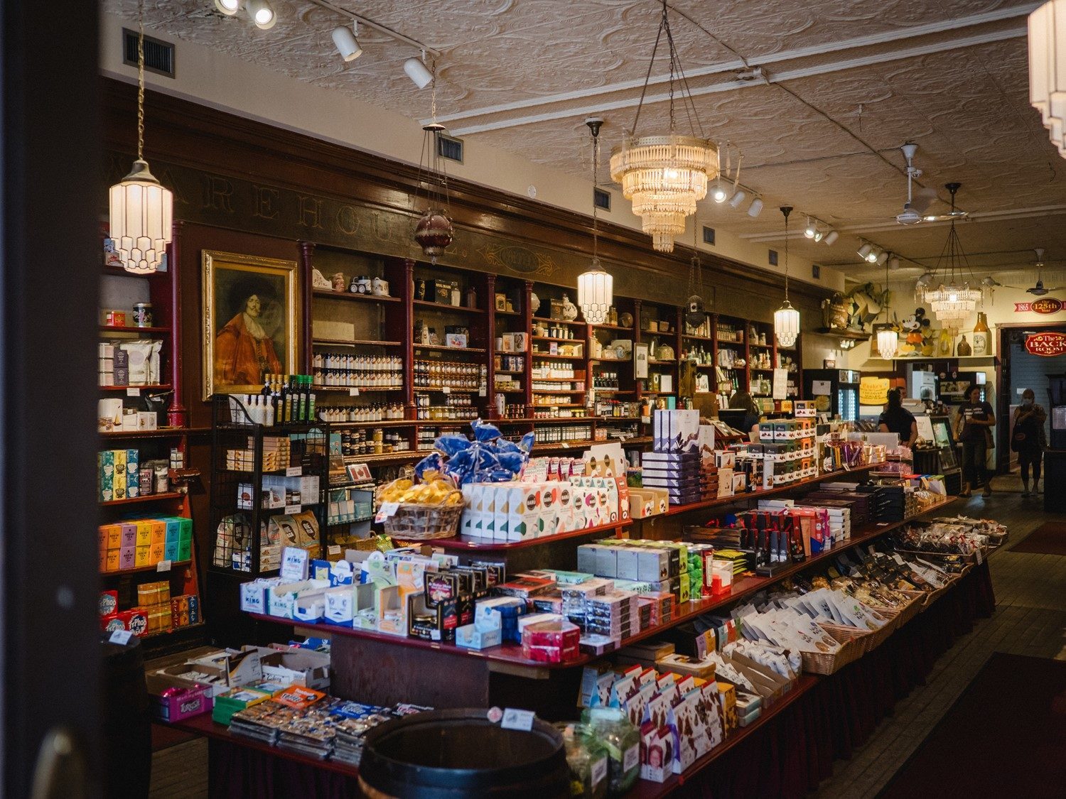 The richly stocked interior of Hartley's, with heritage wood shelving and long counters