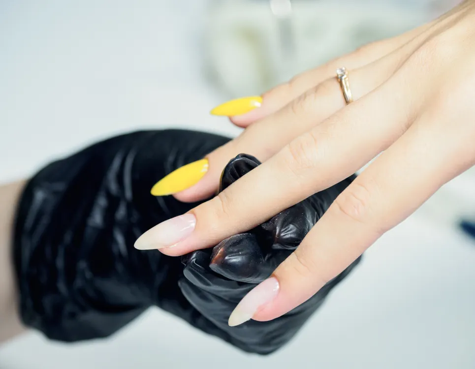 Dark manicure with gold accents